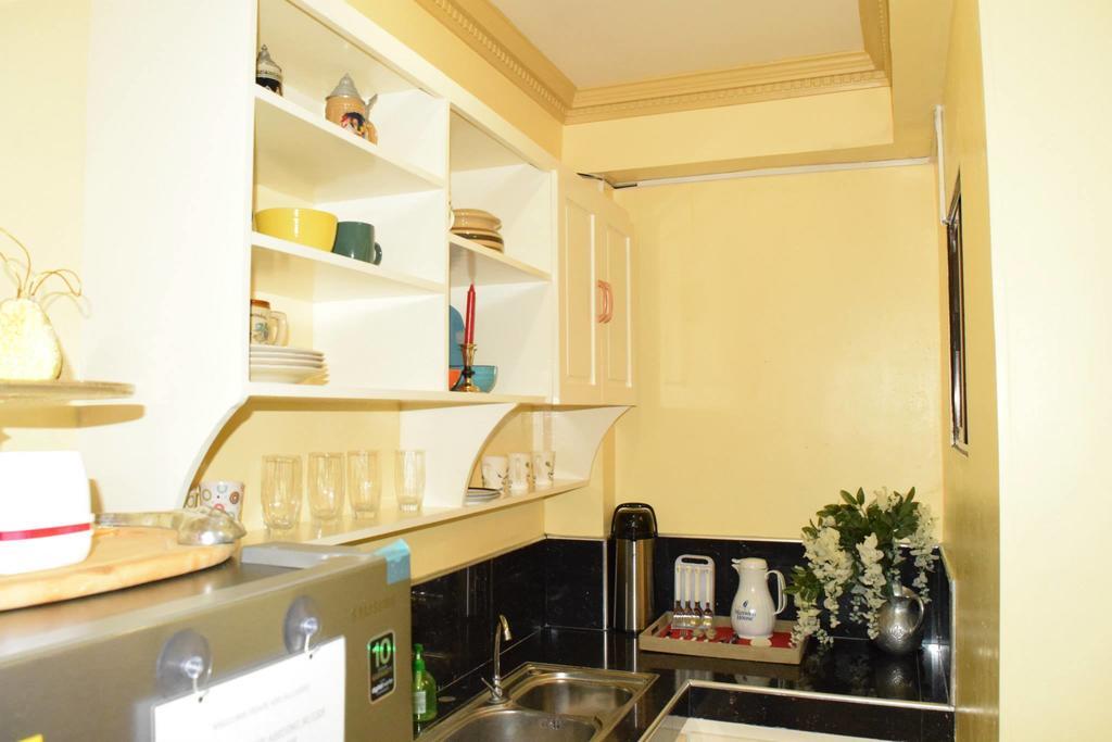 The Saint Joseph Residential Suites Lucena Habitación foto